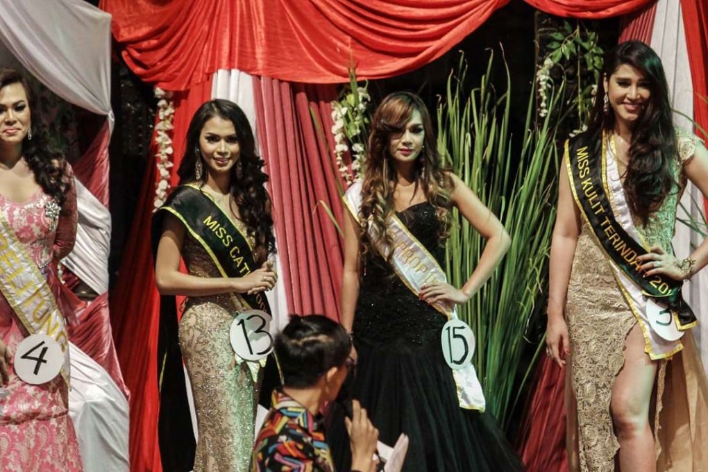 Contestants smile during the crowning of the Miss Queen Contest 2016 in Jakarta, Indonesia. Photo: Xinhua
