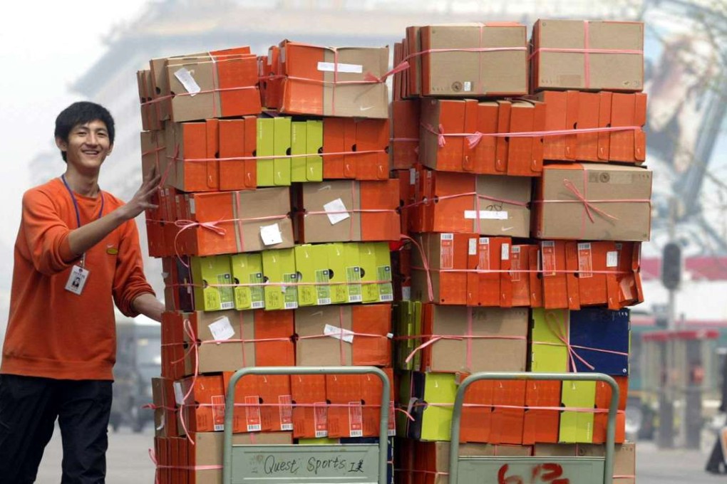 Chinese customers can now buy their favourite Nike sports shoes from overseas web stores without going abroad. Photo: AFP