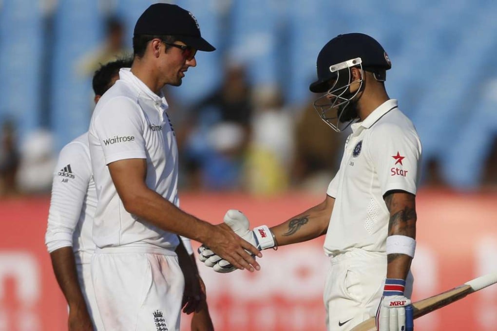 India captain Virat Kohl (right) shakes hand with England captain Alastair Cook. Photo: AP