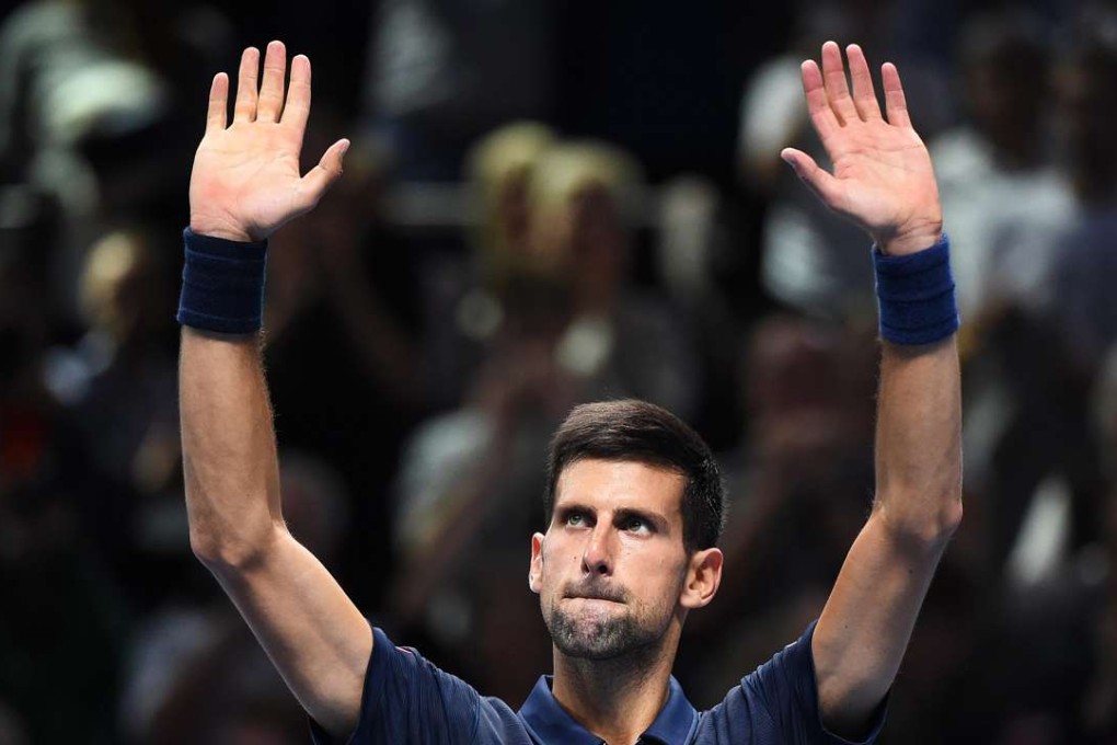 Serbian Novak Djokovic celebrates after defeating Austria’s Dominic Thiem in their singles group match at the ATP World Tour Finals in London. Photo: EPA