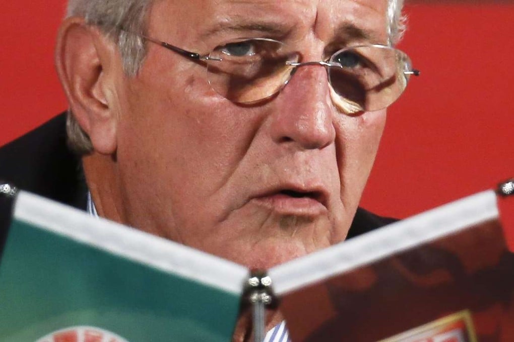China’s newly appointed national team coach Marcello Lippi speaks during a news conference. Photo: AP