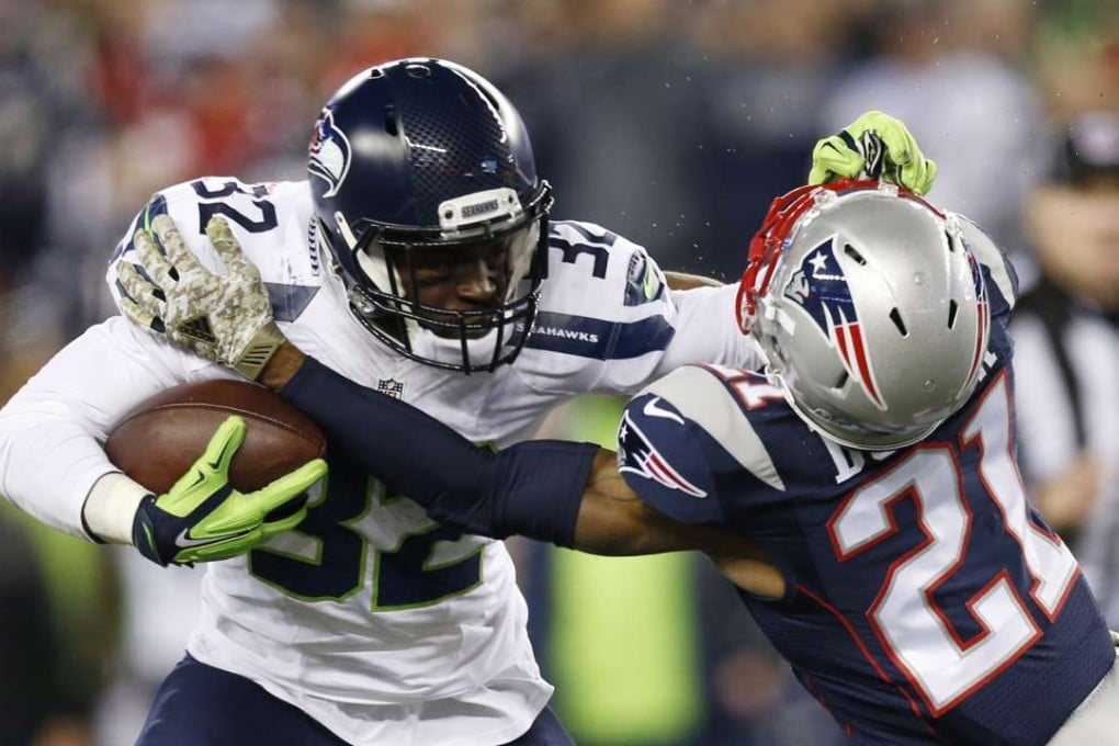 Seattle Seahawks running back Christine Michael is tackled by New England Patriots cornerback Malcolm Butler during the Seahawks’ 31-24 win at Gillette Stadium. Photo: USA Today