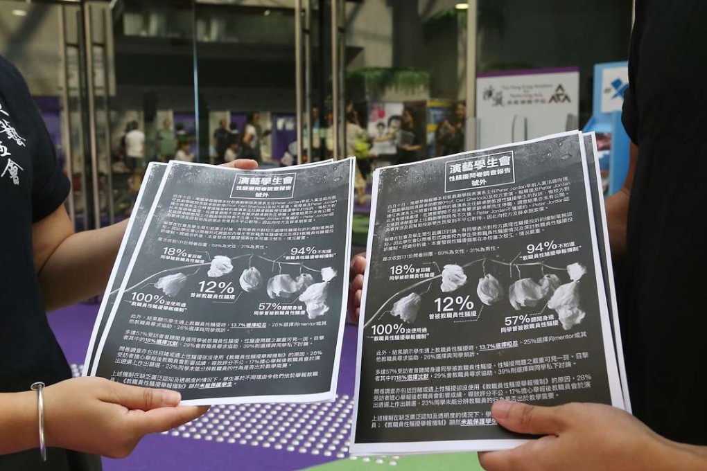 Member of the Students' Union giving out leaflets on Ceri Sherlock incident at the orientation day at Academy for Performing Arts. Photo: K. Y. Cheng