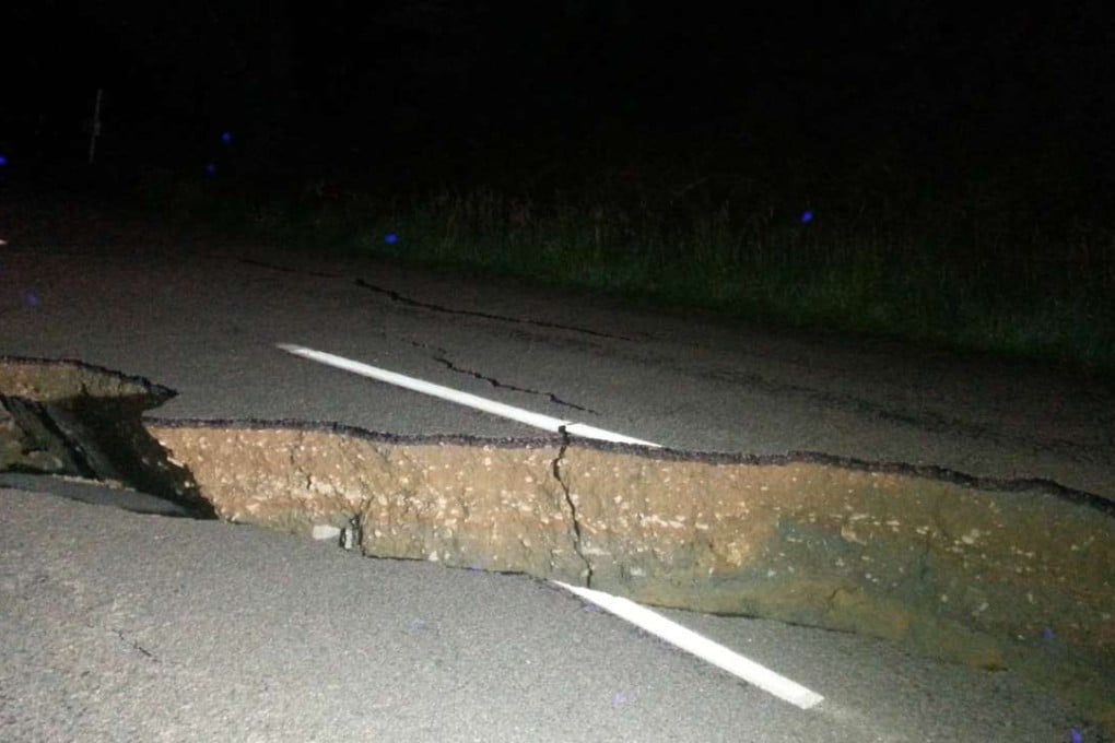 A large fissure runs along Kaikoura Road about two hours north of Christchurch after a major earthquake. Photo: AP