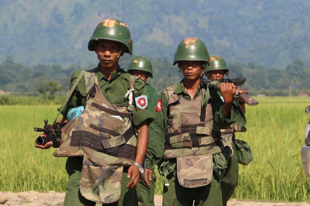 Myanmar soldiers patrol a village in Maungdaw located in Rakhine State. Photo: AFP