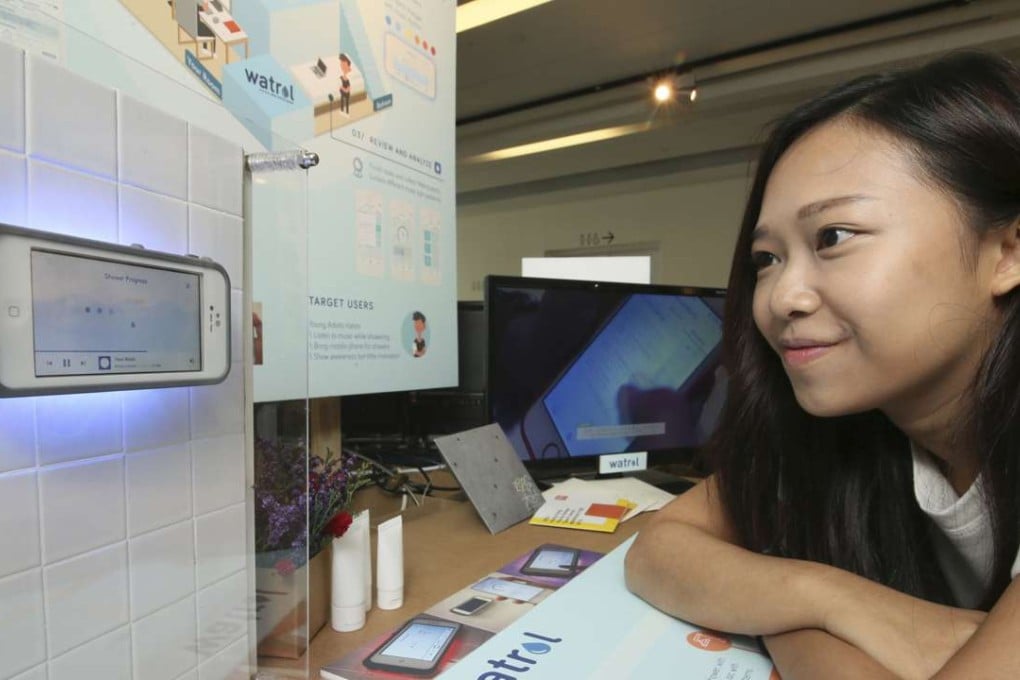 Hong Kong Polytechnic University student Sharon Li with her invention Watrol, which aims to encourage people to gradually reduce water usage during showers, on show at Dubai Design Week. Photo: Courtesy of Dubai Design Week
