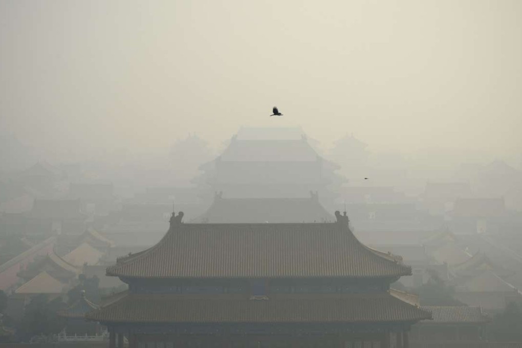 The Forbidden City is shrouded in the heavy air pollution in Beijing in early November. Photo: AFP