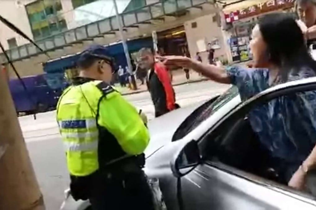 The woman is heard hurling abuse at the officer in the video. Photo: SCMP Pictures