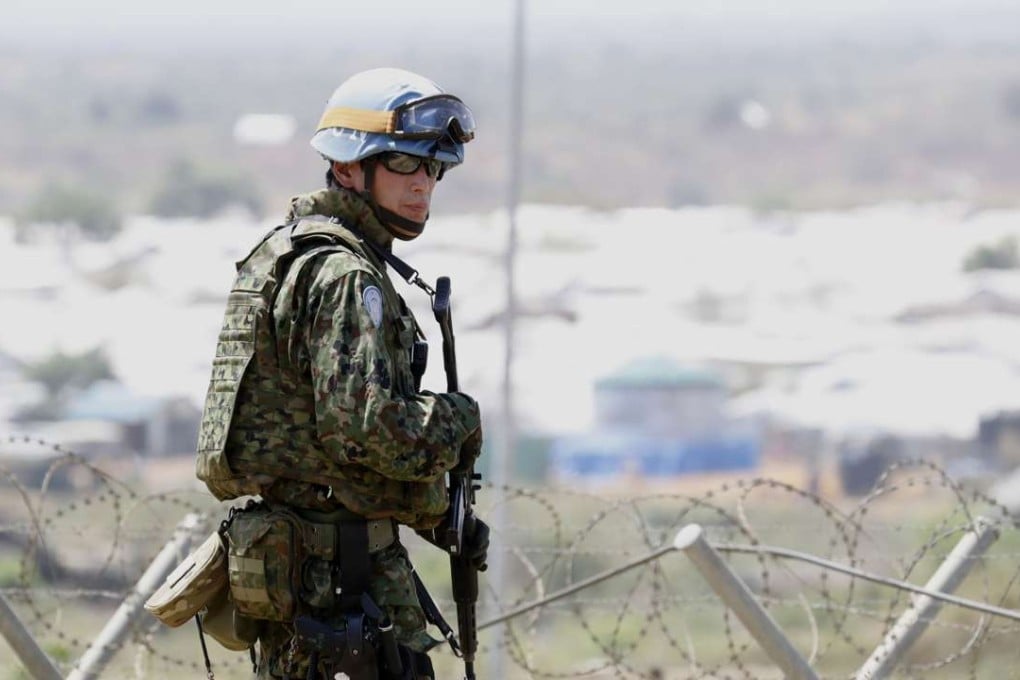 A Japanese ground Self-Defence Force troop stands guard during peacekeeping operations in Juba, South Sudan. Photo: Kyodo