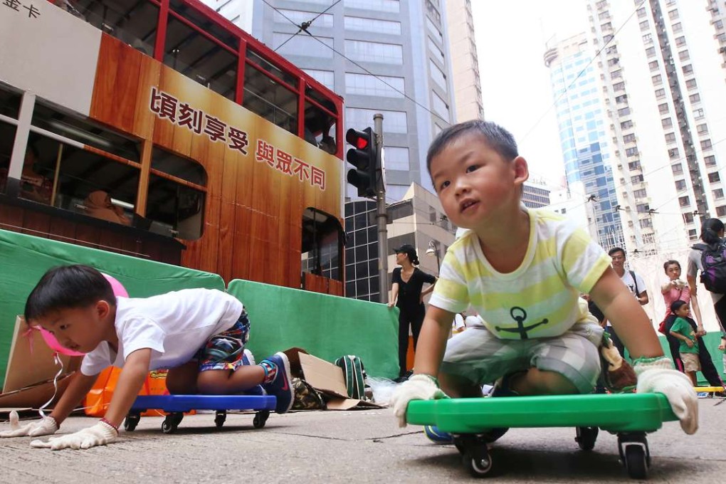 Wheels of a very different kind have the right of way on Des Voeux Road Central as visitors enjoy public space freed up by the “Very DVRC” event on September 25. Photo: David Wong