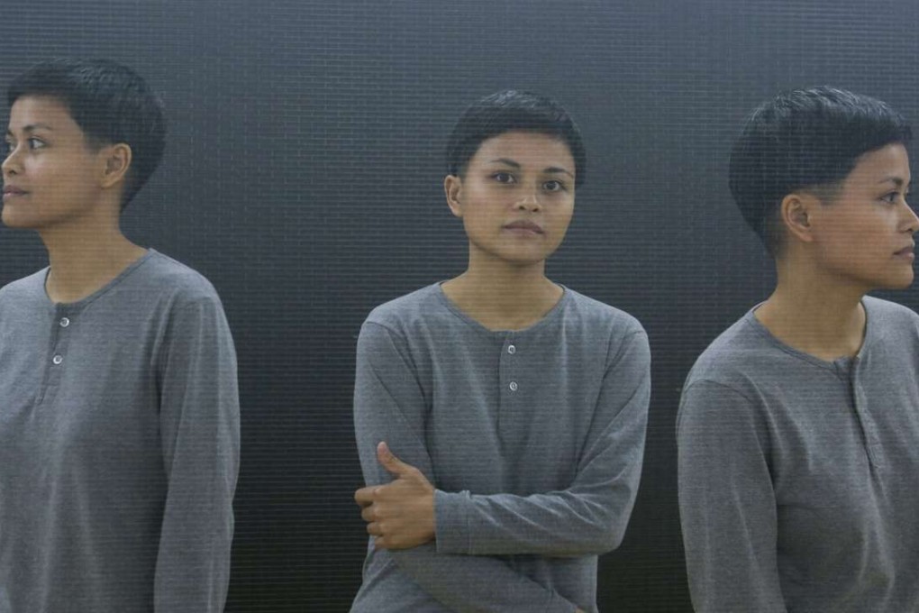 Artist Maria Taniguchi in a multi-exposure shot, in front of her art piece at the Galerie Perrotin. Photo: Chen Xiaomei