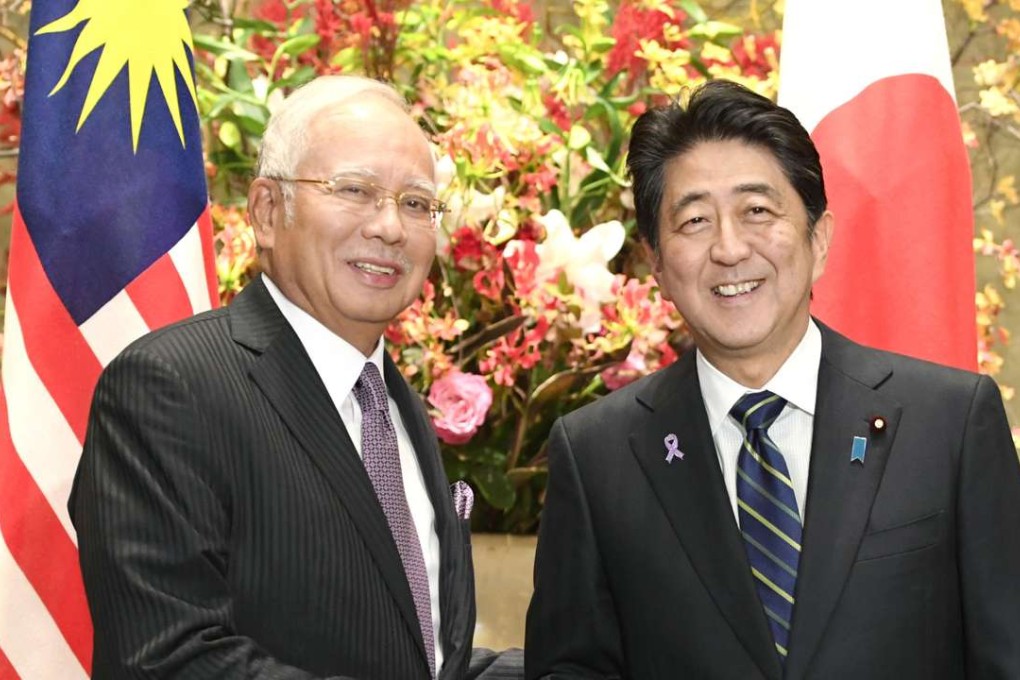Japanese Prime Minister Shinzo Abe and his Malaysian counterpart Najib Razak. Photo: Kyodo