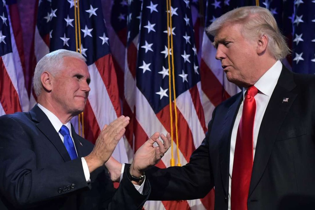 This file photo taken on November 9 shows Republican presidential elect Donald Trump and Vice President elect Mike Pence during election night at the New York Hilton Midtown in New York. Photo: AFP