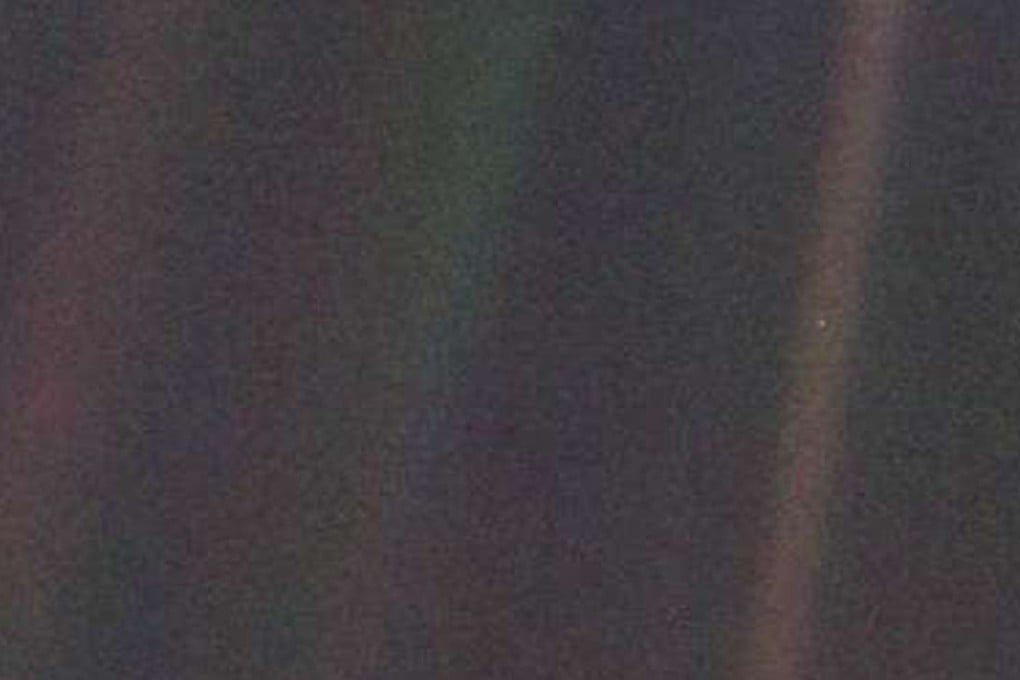 The famous Pale Blue Dot photo of Earth, as seen by Voyager 1 in 1990. The planet can be seen as the tiny speck of blue on the right-most band of light, at a distance of 6 billion kilometres. Photo: Jet Propulsion Lab / Nasa
