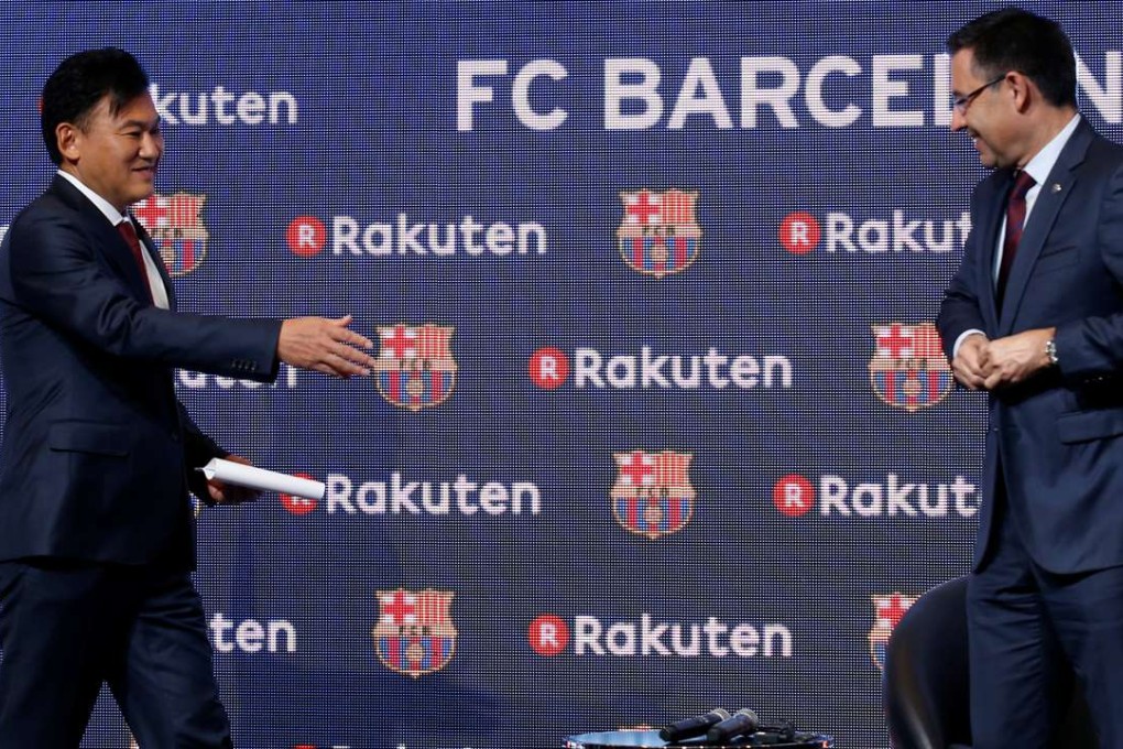 FC Barcelona's President Josep Maria Bartomeu (right) greets Rakuten's President and CEO Hiroshi Mikitani on Wednesday. Photo: Reuters