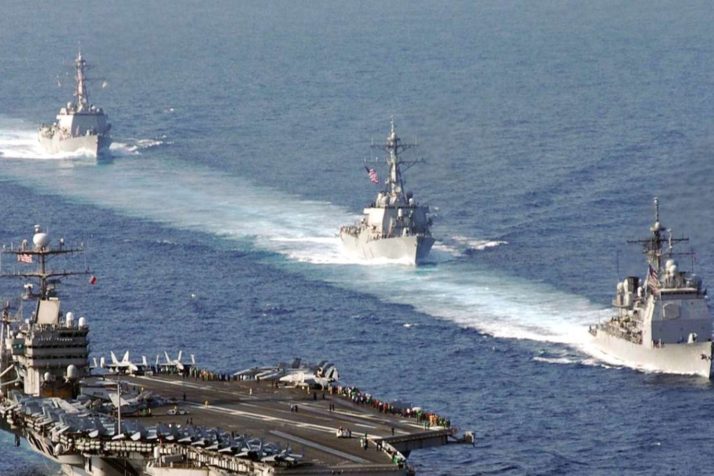USS Mobile Bay, USS Russell and USS Shoup perform a pass and review with the Nimitz-class aircraft carrier USS Abraham Lincoln. Photo: SCMP Pictures
