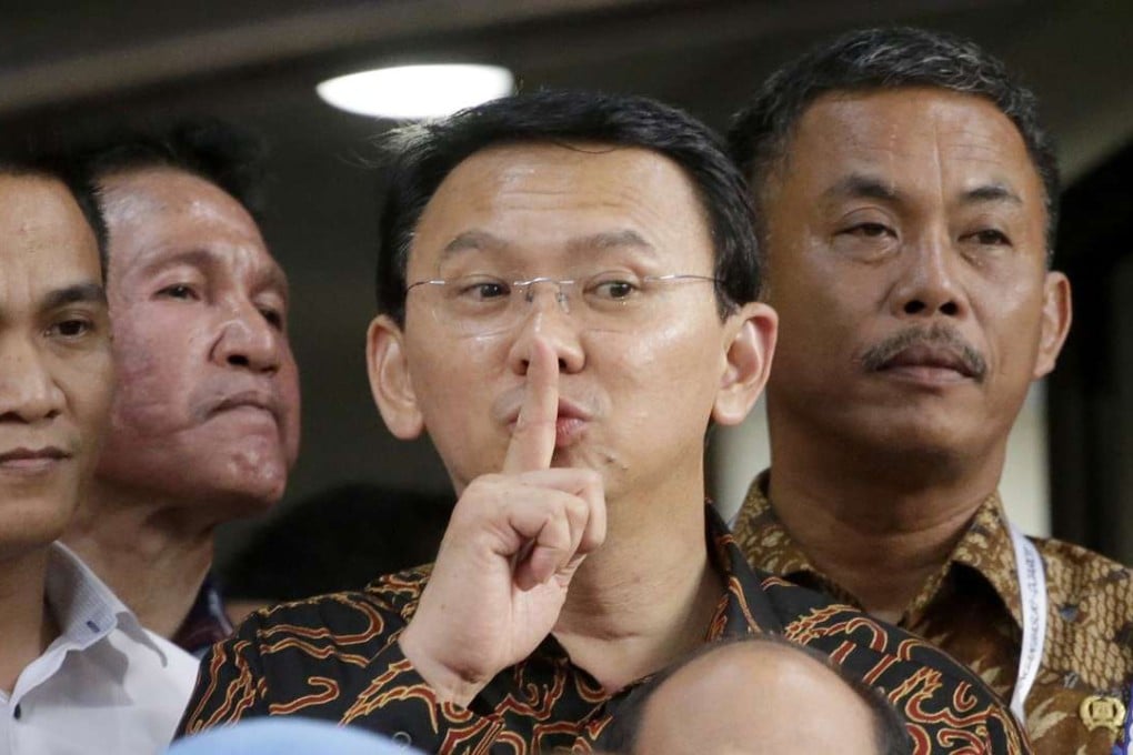 Jakarta Governor Basuki Tjahaja Purnama, popularly known as ‘Ahok’, leaves National Police Headquarters in Jakarta after being questioned by investigators last week. Photo: AP