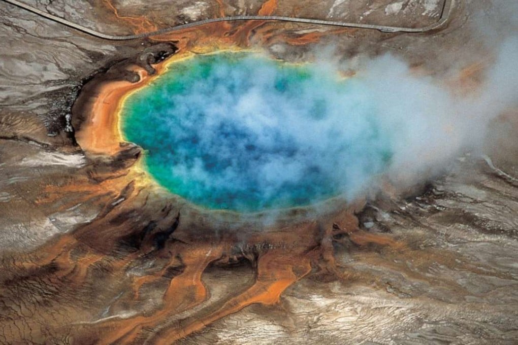 Steam rises from Yellowstone National Park's Grand Prismatic Spring, one of the park's myriad hydrothermal features. Photo: Robert B. Smith and Lee J. Siegel.