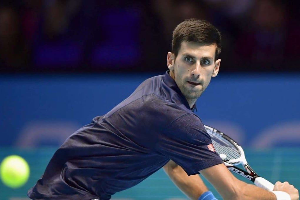 Novak Djokovic prepares to hit a return during his win over Milos Raonic at the ATP World Tour Finals. Photo: Kyodo