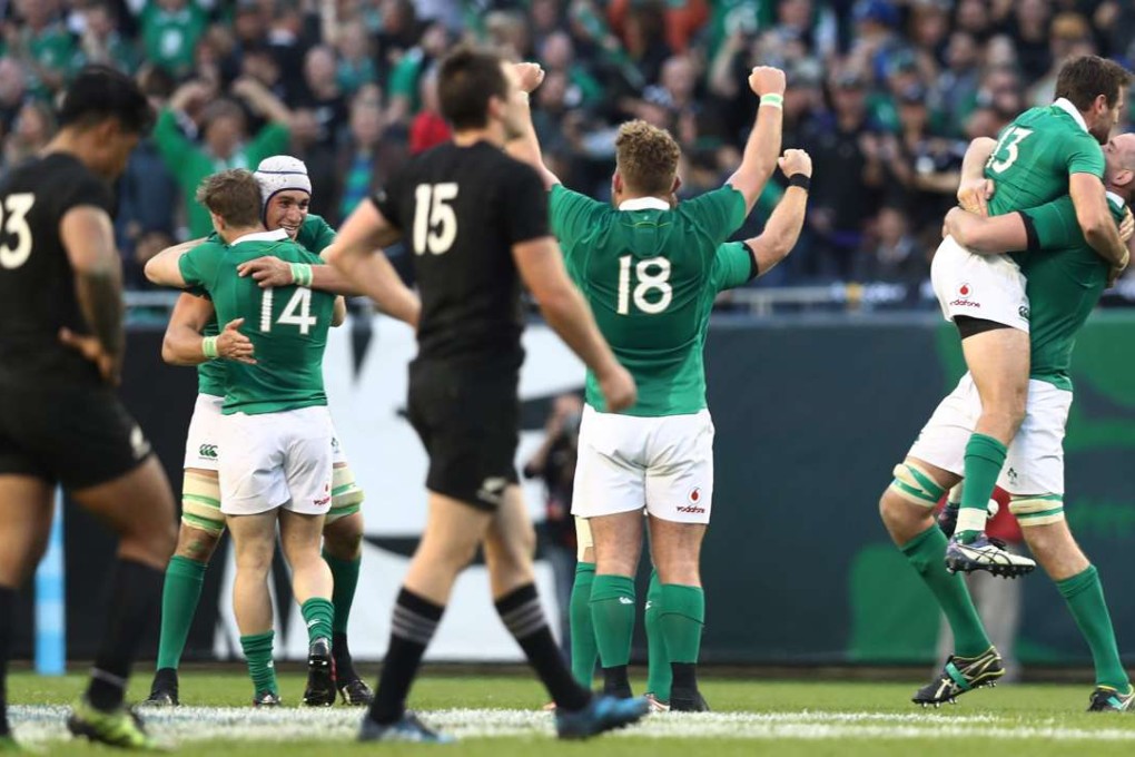 Ireland players celebrate their 40-29 victory over New Zealand in Chicago. Photo: AFP