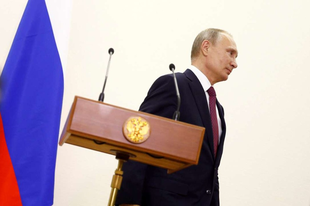 Russian President Vladimir Putin attends a press conference in Germany. Photo: Reuters