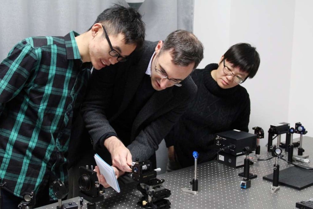 American scientist Zach Smith and his wife and scientific colleague Chu Kaiqin with a student at the University of Science and Technology of China in Hefei, Anhui province. Photo: SCMP Pictures