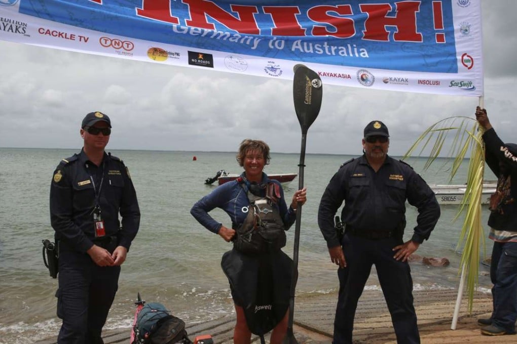 Australian adventurer Sandy Robson after coming ashore on the island of Saibai in the Torres Strait at the end of her journey.