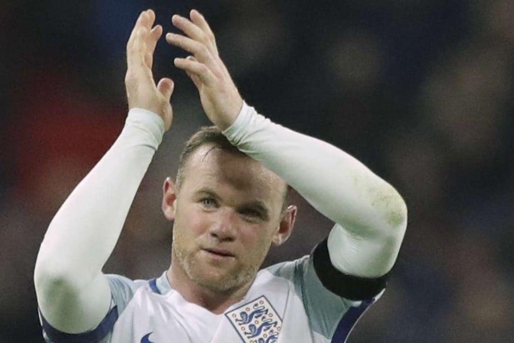 England's Wayne Rooney claps after winning the World Cup group F qualifying soccer match between England and Scotland with a 3-0 score at Wembley stadium, London. Photo: AP