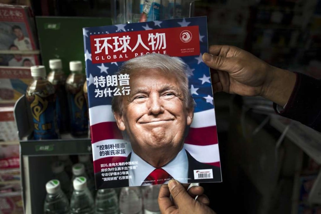 A copy of the Chinese magazine Global People with a cover story asking ‘Why did Trump win?’ in Shanghai. Photo: AFP
