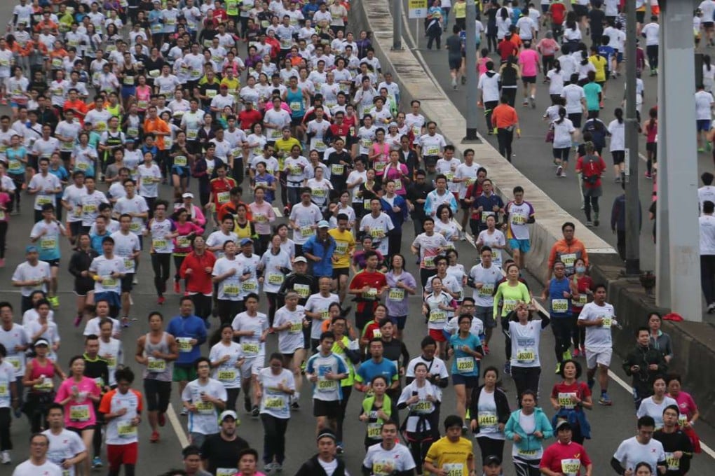 At its simplest, running a distance race such as the Hong Kong Marathon (pictured) is about oxygen, energy and water. Photo: Felix Wong