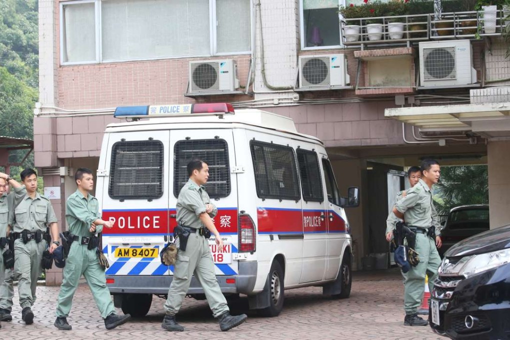 Police investigate the break-in at Sea Cliff Mansions in Repulse Bay. Photo: David Wong