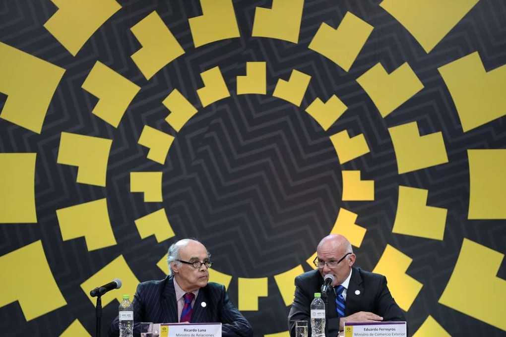Peruvian Foreign Minister Ricardo Luna Mendoza (left) and Peruvian trade minister Eduardo Ferreyros attend a press conference at the Apec meeting in Lima, Peru, on Friday. Trade and foreign ministers from 21 nations concluded their meeting by calling for a fight against protectionism and trade-distorting measures. Photo: Xinhua