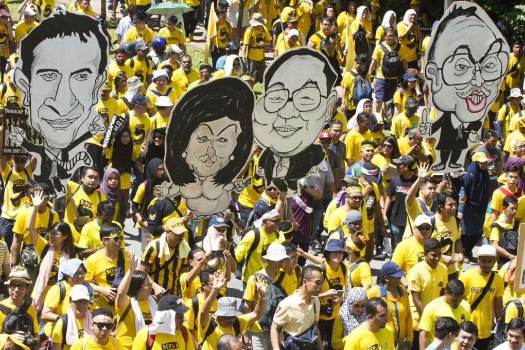 Activists from the Coalition for Clean and Fair Elections (Bersih), march during a rally in Kuala Lumpur. Photo: AP