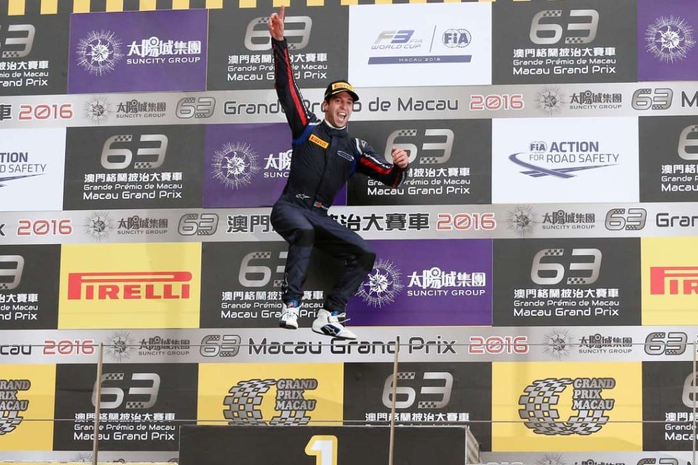 Antonio Felix Da Costa leaps high on the podium after winning the 63rd Macau Grand Prix. Photos: K. Y. Cheng
