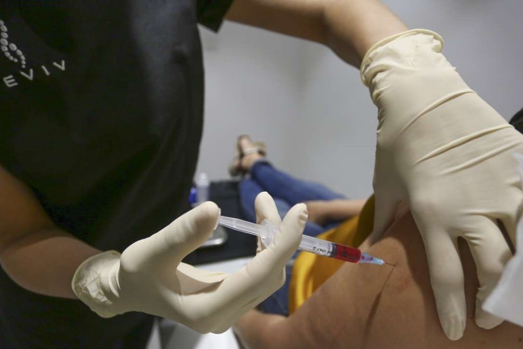 SCMP writer Kylie Knott gets a B12 booster at Reviv. Photo: Jonathan Wong