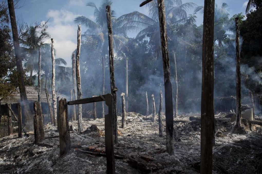 Smouldering debris of burned houses in Warpait village, a Muslim village in Maungdaw located in Myanmar's Rakhine state, in October. Photo: AFP
