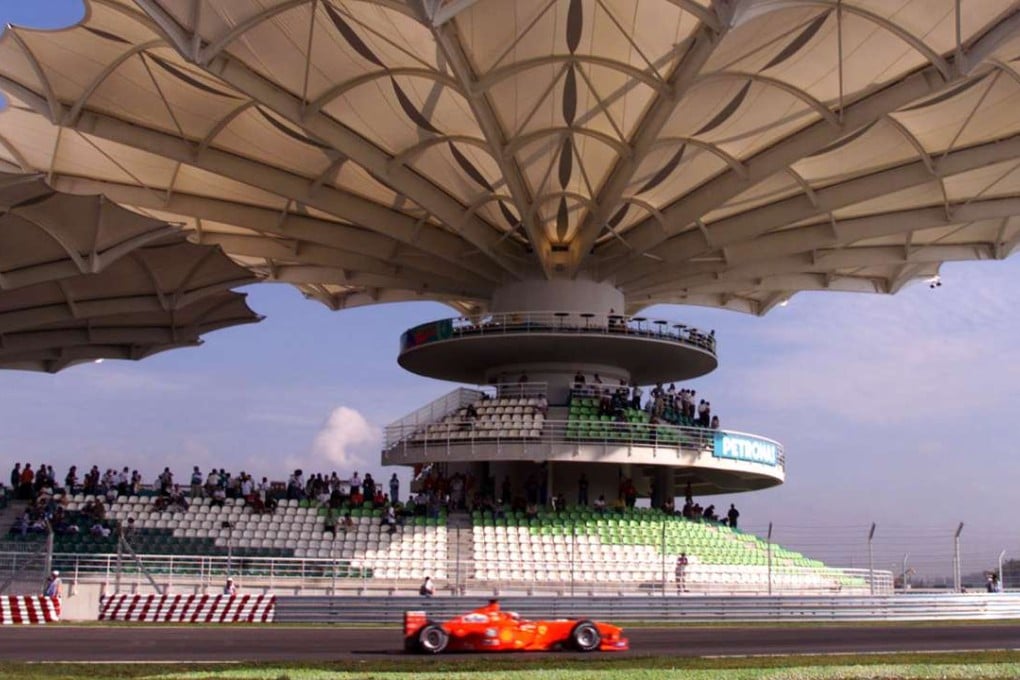 Eddie Irvine on his way to victory in the inaugural Malaysian Grand Prix in 1999. Photo: Reuters