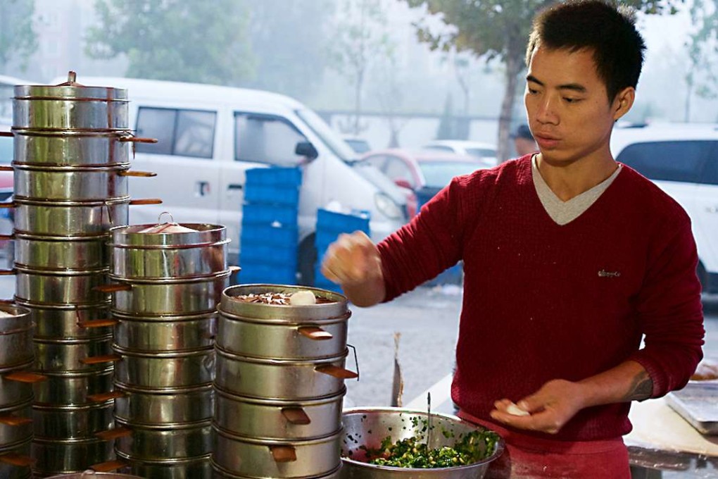 Qi Shumin, who comes from a small village in Anhui province, dropped out of school at the age of 13. Photo: Tom Wang