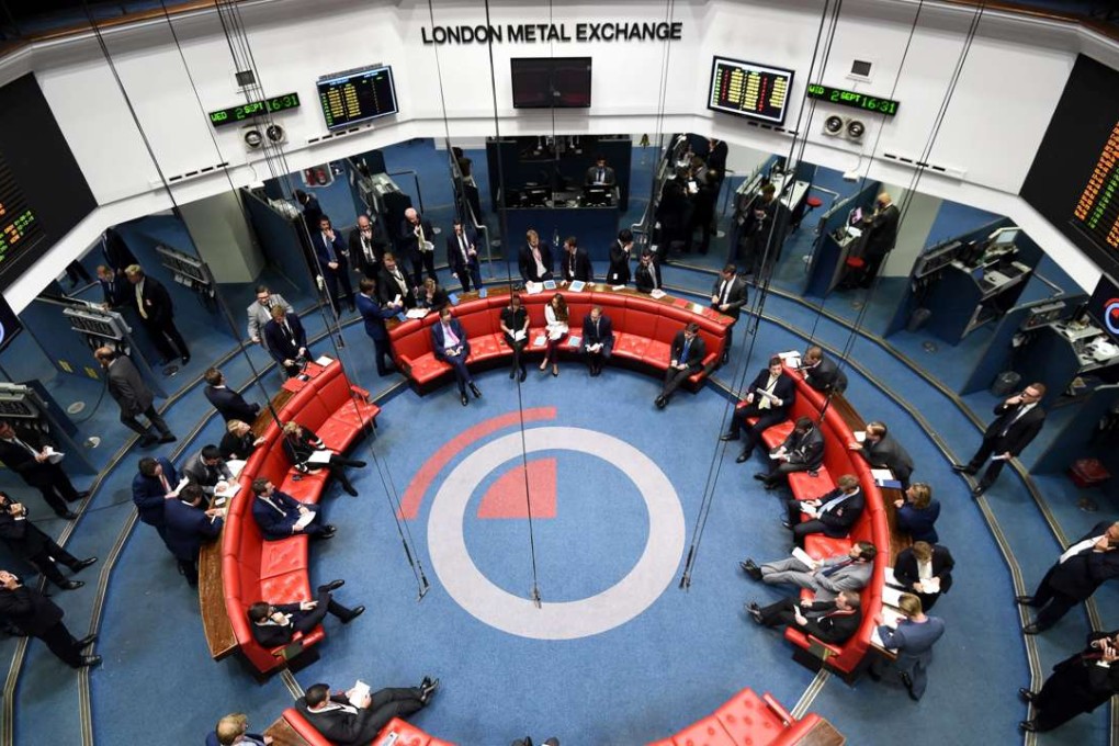 Floor traders on the London Metal Exchange’s famous Ring trading floor in London. Photo: EPA