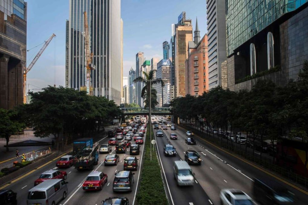 Traffic on Gloucester Road in Wan Chai. In a good start, the Lands Department has launched a public information portal called GeoInfo Map, which contains over 180 kinds of spatial data provided by 26 government departments. Photo: AFP