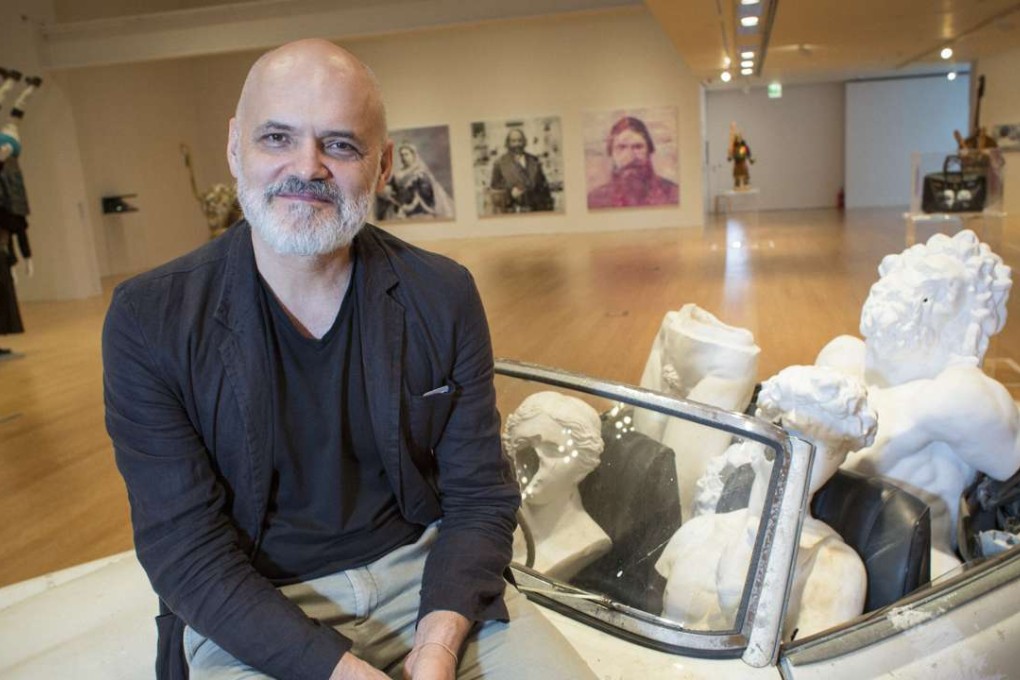 Konstantin Bessmertny with his artwork "Ride ", on show at the Ad Lib exhibition in Macau. Photos: May Tse