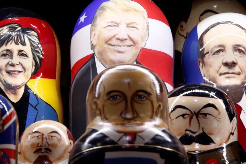 Matryoshka dolls bearing the faces of German Chancellor Angela Merkel, Donald Trump, French President Francois Hollande, Britain’s Queen Elizabeth, Vladimir Lenin, Russian President Vladimir Putin and Josef Stalin are displayed at a souvenir shop in central Moscow. Photo: Reuters