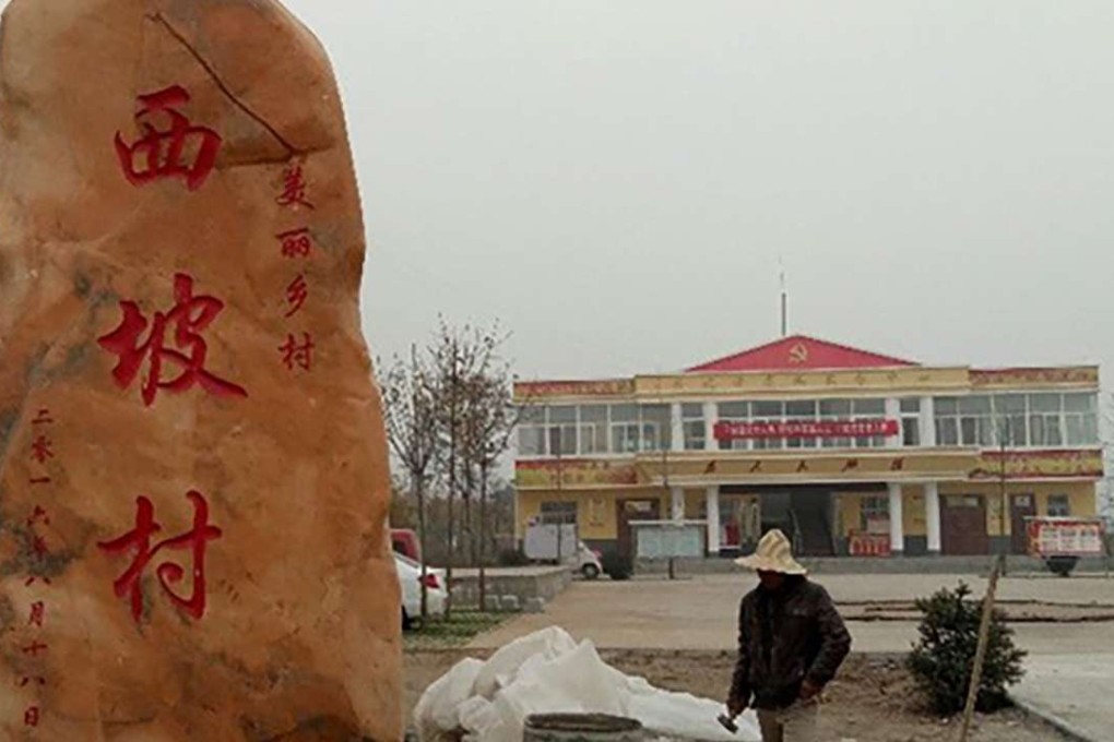 The new office building in Xipo village in Shaanxi province was reportedly built using funds provided by a local contractor. Photo: SCMP Pictures