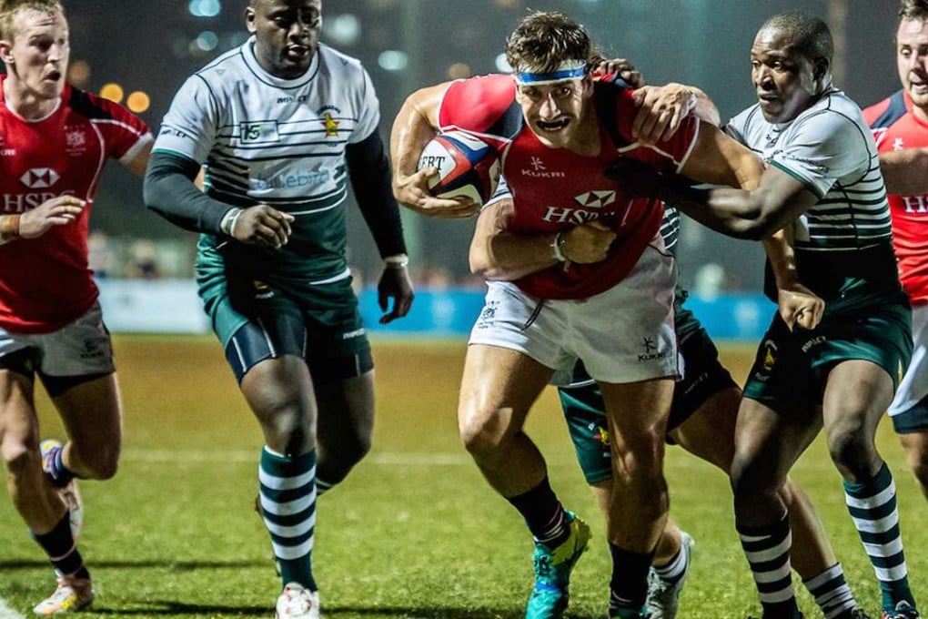 Ally Maclay drives Hong Kong forward against Zimbabwe in the Cup of Nations. Photo: SCMP Pictures