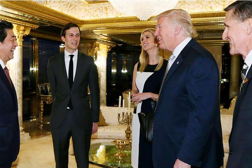 Japanese Prime Minister Shinzo Abe (left) at a meeting in New York on November 17 with US president-elect Donald Trump (second right) and (from left) Trump son-in-law Jared Kushner, his wife Ivanka Trump and Trump’s national security adviser Michael Flynn. Photo: AFP/Japanese cabinet secretariat