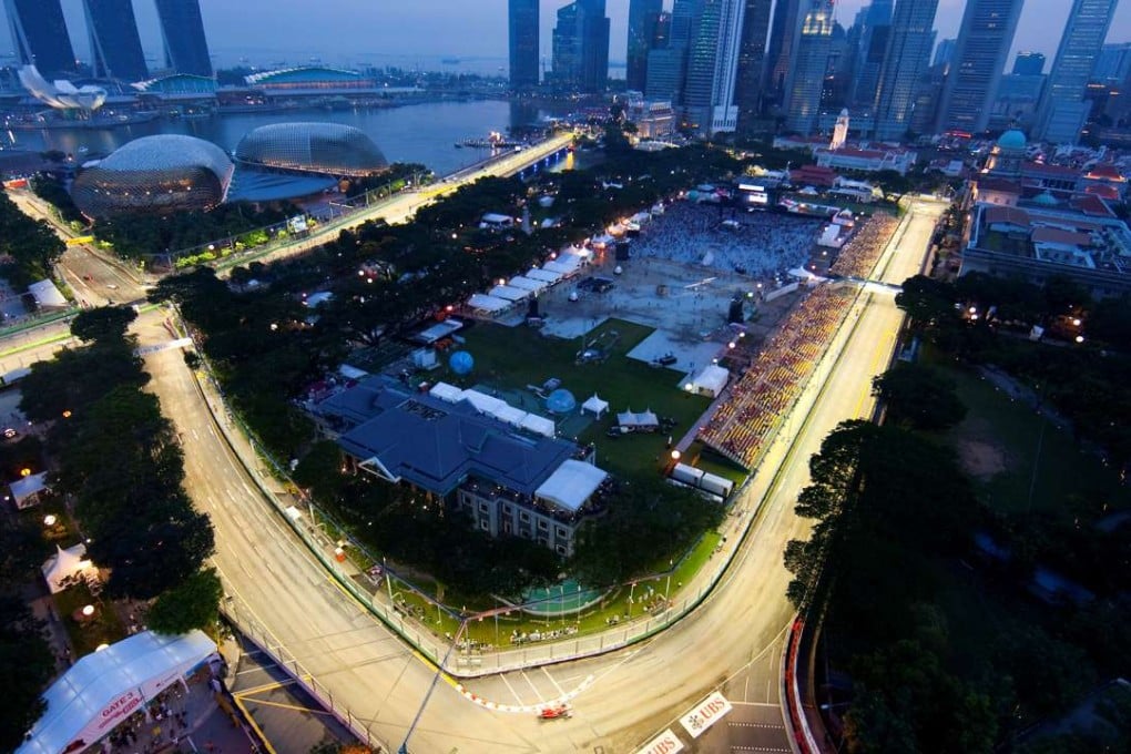 Night racing in Singapore is a key part of the grand prix’s allure. Photo: Reuters