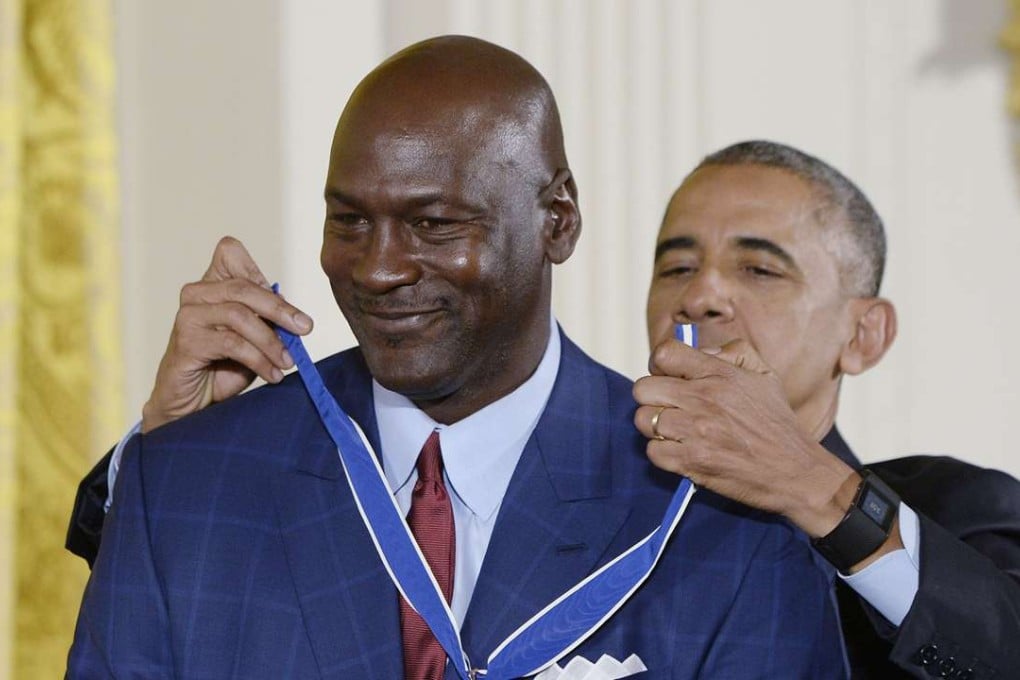 U.S. President Barack Obama presents Michael Jordan with the Presidential Medal of Freedom, the nation's highest civilian honor, during a ceremony on Tuesday, Nov. 22, 2016 honoring 21 recipients in the East Room of the White House in Washington, D.C. (Olivier Douliery/Abaca Press/TNS)