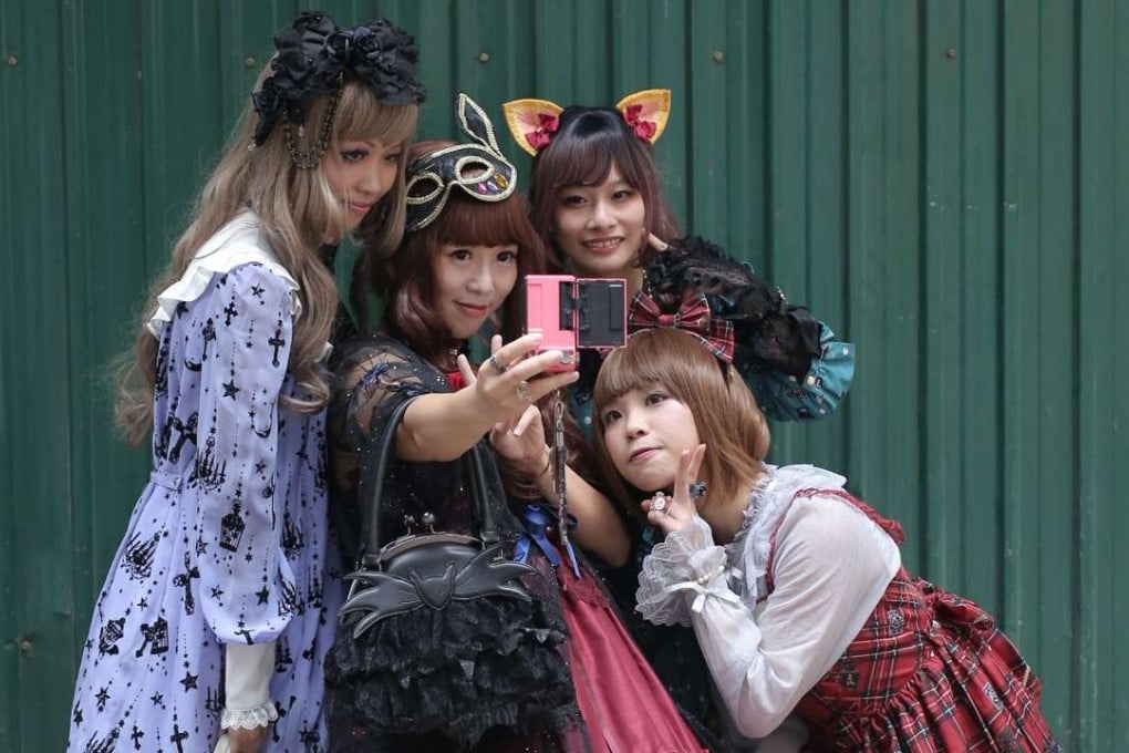 Hong Kong Lolitas (from left) Clara Lau, Angela Leung, Sammi Wong and Kat Wong in Causeway Bay. Picture: Paul Yeung