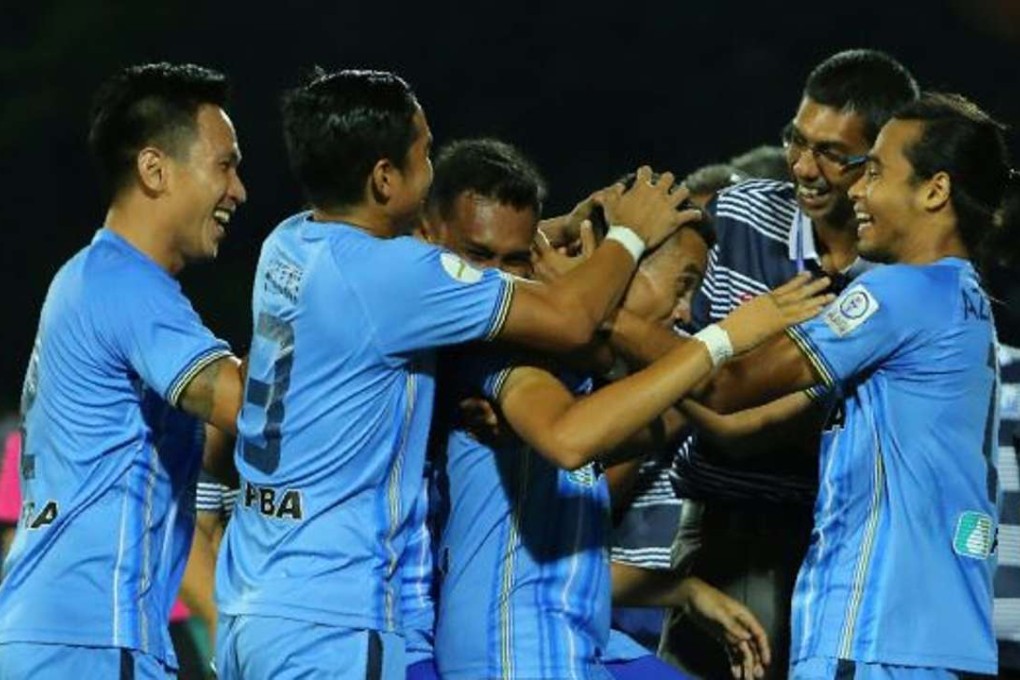 Mohd Faiz Subri is congratulated on his goal. Photo: thestar.com.my