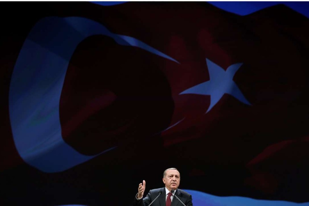 Turkish President Tayyip Erdogan addresses police officers and cadets during a conference in Ankara on Tuesday. Photo: Reuters